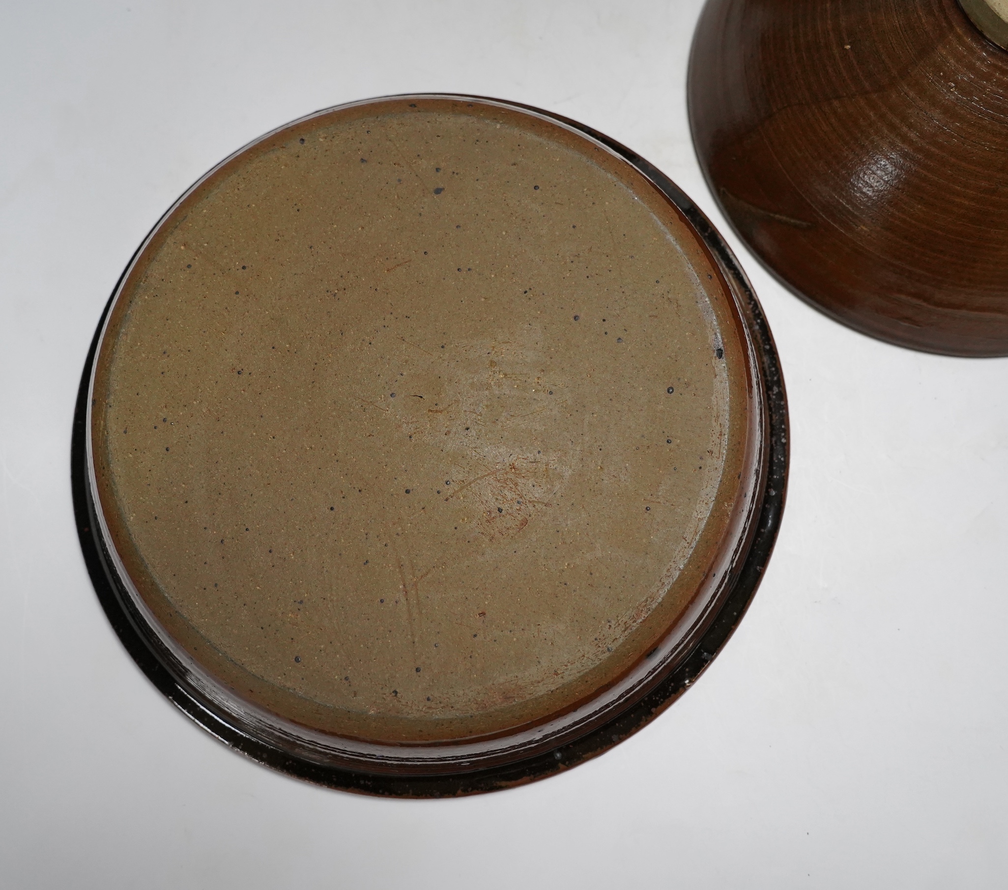 A David Melville studio stoneware pot and cover, a large dish and plate, largest 30cm diameter